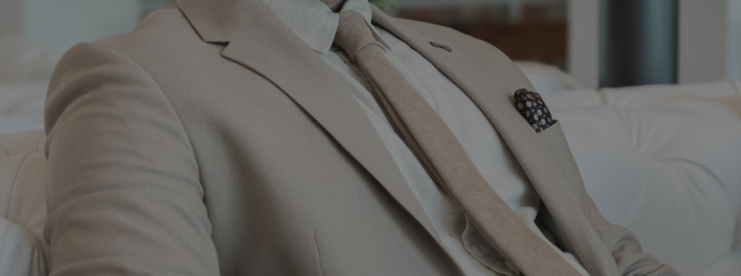 Beige tie with a beige suit