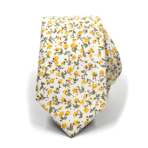 The floral marigold yellow tie rolled up