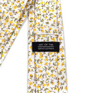 The back of the floral marigold yellow tie