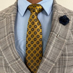 Royal Golden Dots Tie with Brown Plaid Suit and Navy Rose Lapel Pin